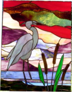 stained glass panel of blue heron