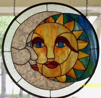 sun and moon stained glass panel by karen long