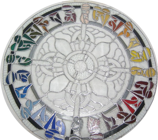 buddhist prayer wheel stained glass