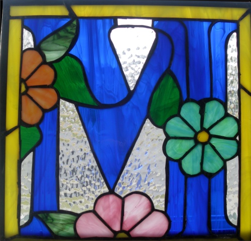 letter M and flowers stained glass pamnel