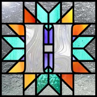 lone star quilt block pattern with the letter H for stained glass