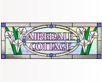 (image for) Airedale cottage (with lilies and oval) transom